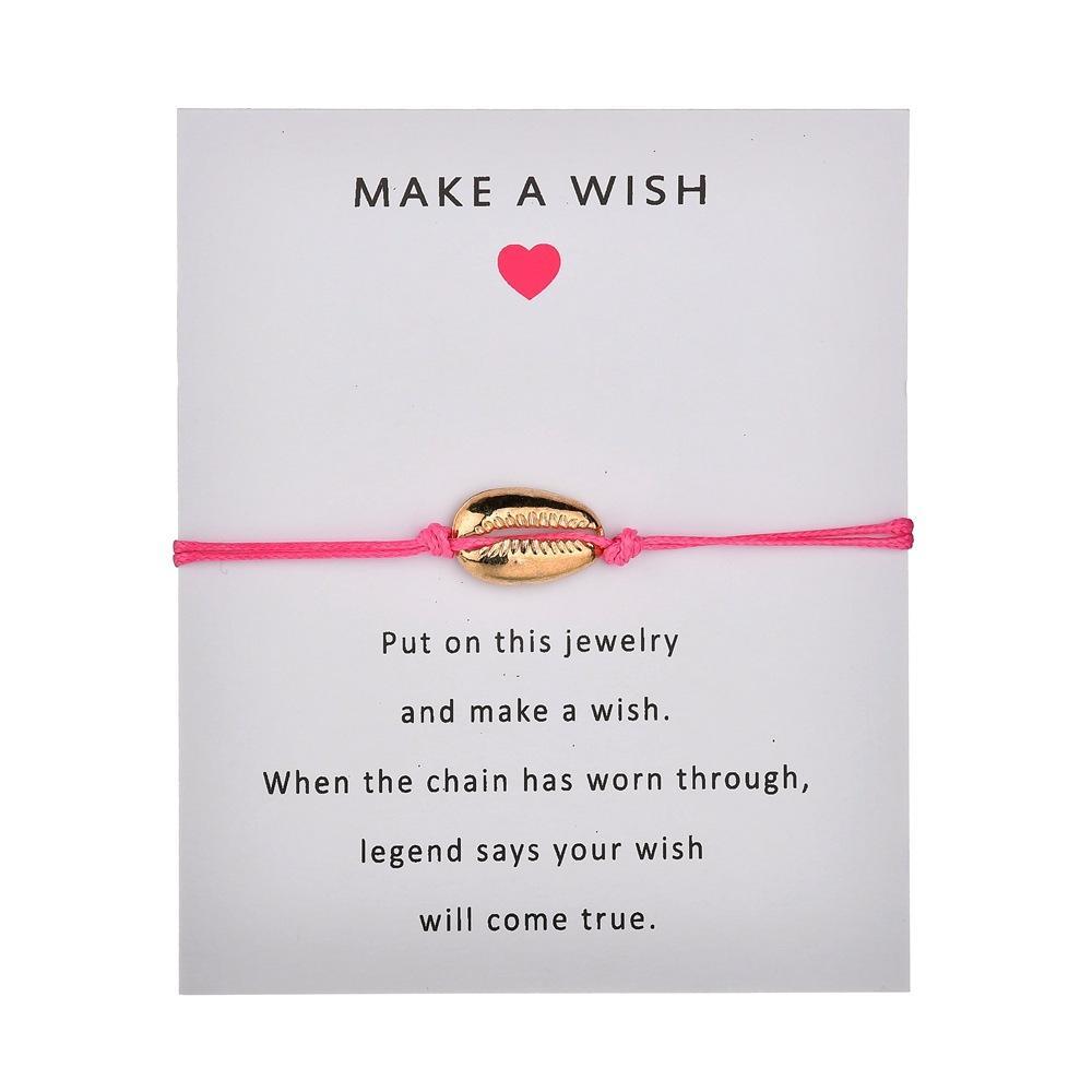 Armband "Make a Wish" Freundschaftsarmband im Beach Look mit Kauri Muschel vergoldet, Textil in Rosa, größenverstellbar