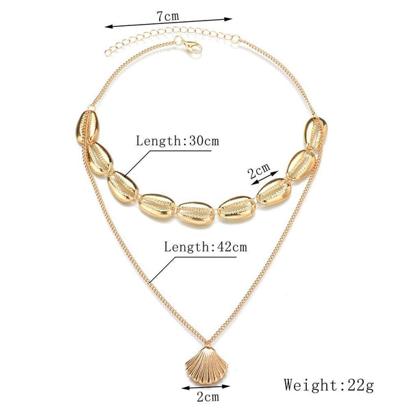 Choker Halskette mit goldenen Kauri Muscheln im Layer Look